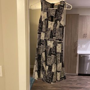 Black and white sleeveless skater dress